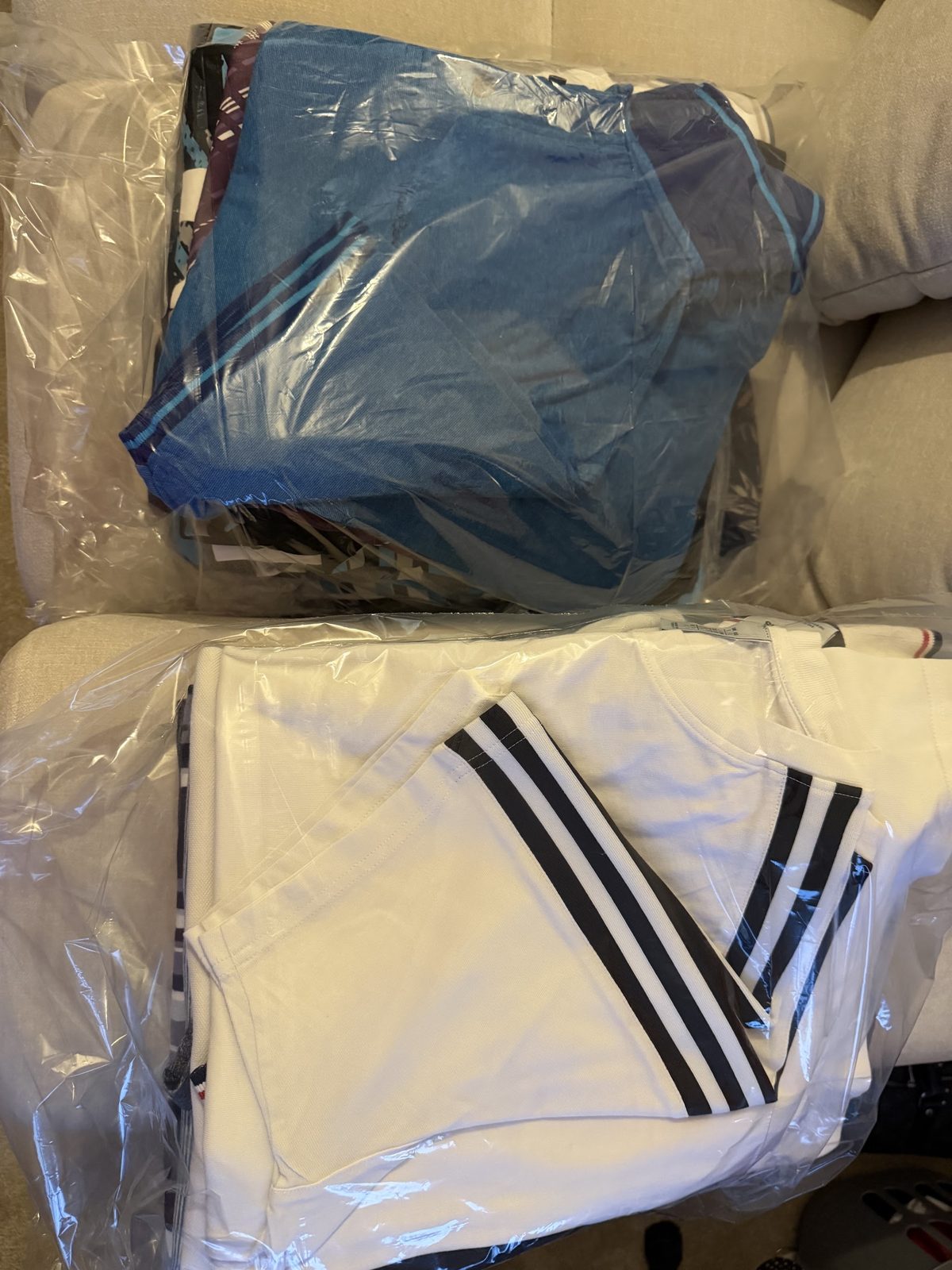 Finished laundry folded and packed in clear bags, ready to go back to the customer