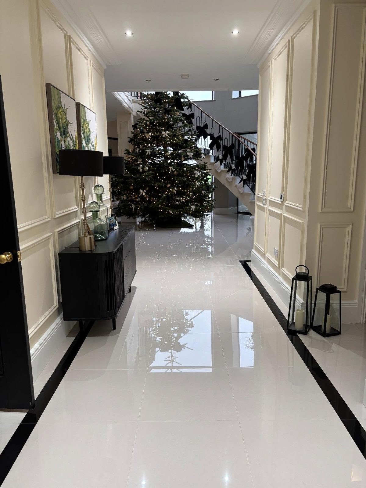 A polished white marble hallway shining after a deep clean